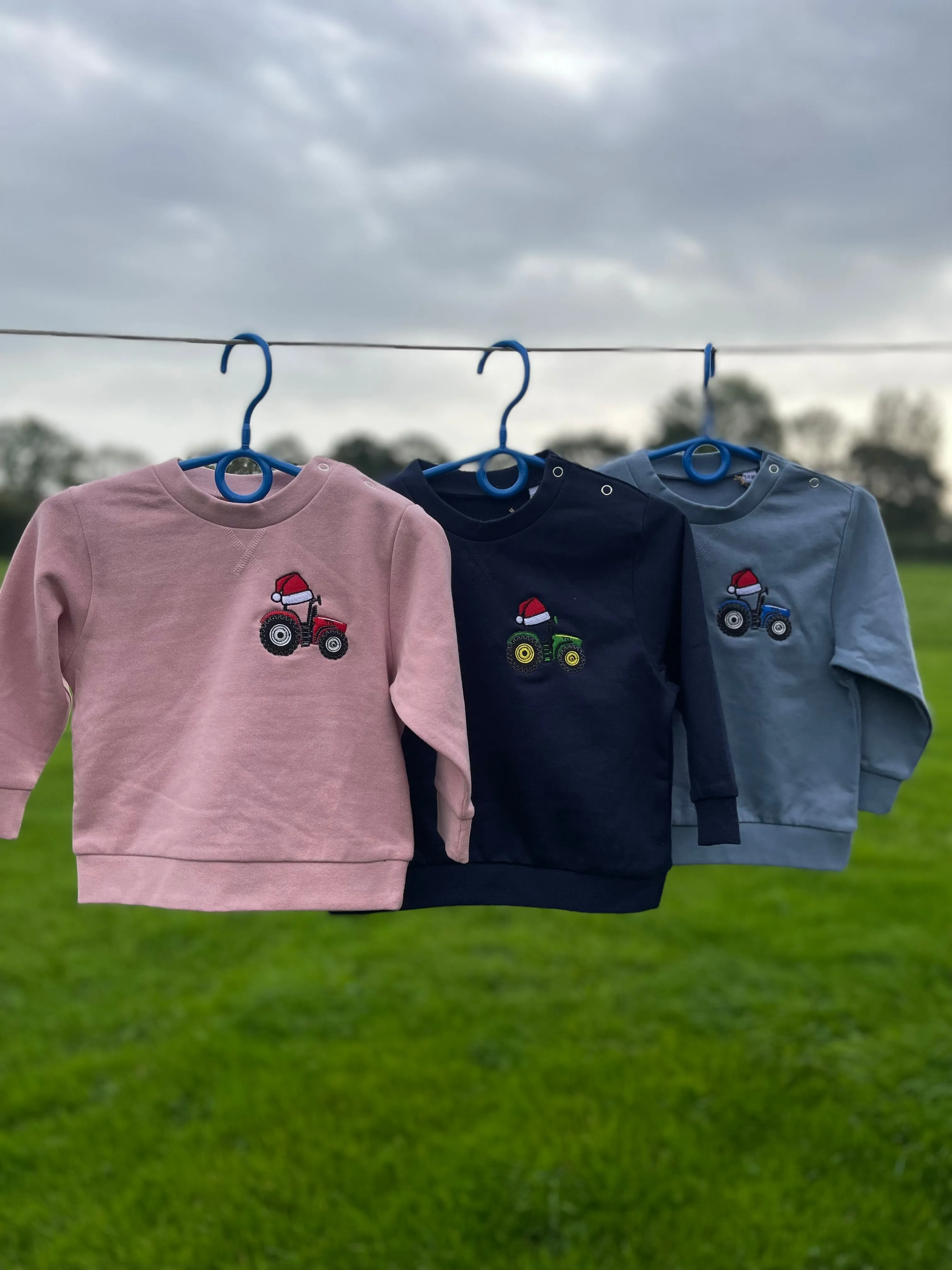 Children's Christmas Sustainable Sweatshirt Embroidered With Tractor Santa Hat Design